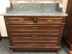A late Victorian mahogany marble topped washstand
