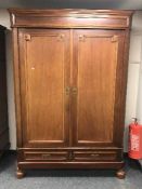 A late Victorian mahogany double door wardrobe