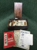 A Mah-jong set in stained pine box with score guide and rules