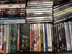 Four baskets of assorted dvds