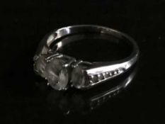 A white gold dress ring stamped 10k, 2.
