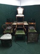 An early twentieth century oak dining table together with seven miscellaneous chairs and a tapestry