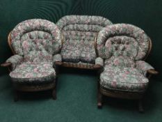 A three piece wooden framed cottage suite comprising of two seater settee,
