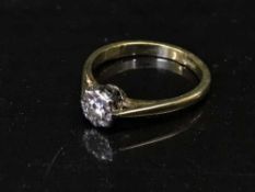 An 18ct gold diamond solitaire ring