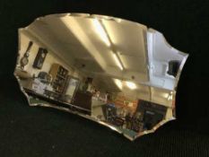 A frameless bevelled mirror