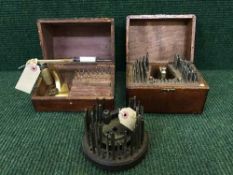 An antique horologist's tap and die set, in mahogany box together with another set similar,