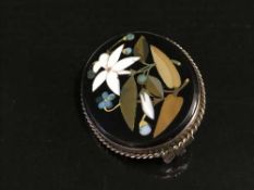 A petra dura brooch in gold mount