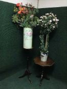 An Italian style pedestal wine table together with a mahogany leather topped plant stand and two