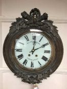 An early twentieth century carved time piece, the dial named Potter & Desbois, London & Paris,