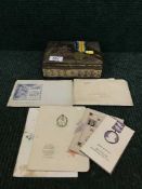 A vintage tin of WWI medals and ephemera
