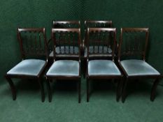 A set of six mahogany Regency style dining chairs