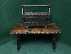 A rustic pine refectory coffee table with matching magazine rack and a spinning chair
