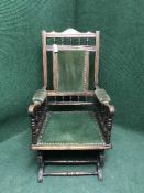 An Edwardian rocking chair