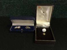 A pair of 18ct gold, enamel and mother of pearl cufflinks,