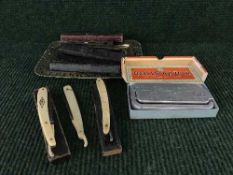 A Collection of early 20th century cut throat razors