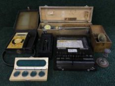 A box of Bakelite cased calibration set, British Telecom boxed meter,