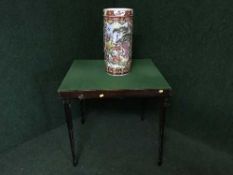 A folding base topped card table together with an oriental style stick stand