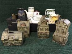 A box of Wedgwood Barlaston tea for two, Royal Doulton tea pot, pottery money boxes,