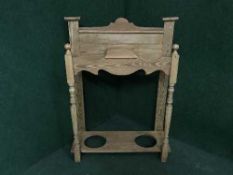 An early twentieth century pine hall stand