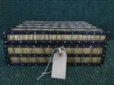 A porcupine quill table box with key