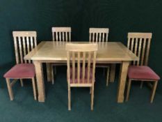 A contemporary seven piece dining room suite comprising of sideboard,