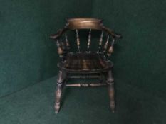An oak captain's armchair