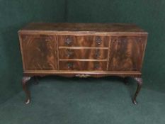 An eight piece mahogany dining room suite