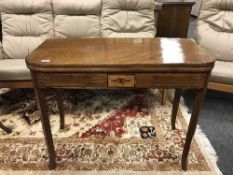 A Victorian inlaid mahogany folding tea table