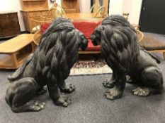 An impressive pair of bronze seated lions, height 1m.