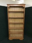 A set of pine open bookshelves