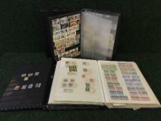 Three leather bound stamp albums containing British stamps