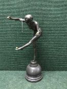 A bronze figure on marble base,
