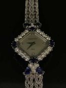 A fine Bueche Girod 18ct white gold diamond and sapphire set cocktail watch,