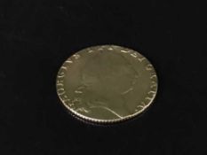 A George III spade guinea dated 1793