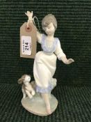 A Lladro figure - Wednesdays child,