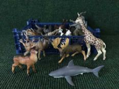 A basket of Papo plastic animals