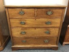 A Georgian inlaid oak chest of five drawers