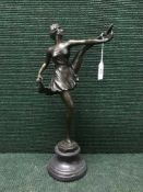 A bronze figure on marble base,