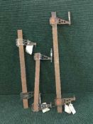 Three Moore and Wright precision clamps
