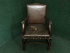 A Gainsborough style studded leather armchair (leather a/f)