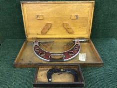 Two prescision measures in wooden cases, one by Ambrose Shardlow ltd.