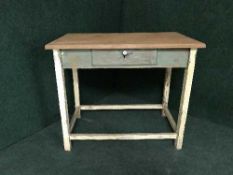 A painted pine kitchen work table fitted with a drawer