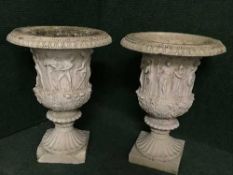 A pair of classical design garden urns
