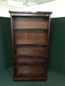 A large set of mahogany open shelves