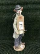 A Lladro figure - Clown with violin,