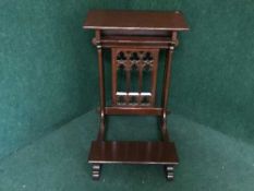 A stained oak church prayer stand