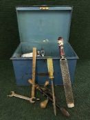 A metal deed box of hand tools