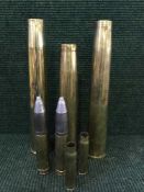 Eight brass ammunition shells