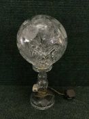 A cut-glass table lamp