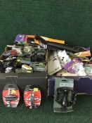 Three boxes of biking accessories including grips, bottle holders, mud guards, pedals etc.
